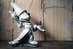 A 20thC Stone Figure of Mickey Mouse; The Sorcerer’s Apprentice in Fantasia