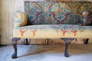 A George III Walnut Needlepoint Tapestry Upholstered Settee
