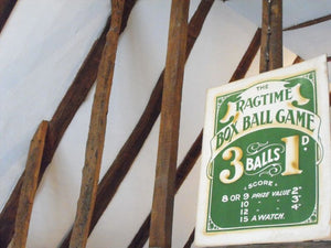 An Original Vintage Fairground Advertising Sign for 'The Ragtime Box Ball Game'