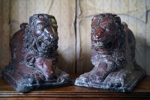 A Pair of Early 20thC Faux Antico Rosso Painted Recumbent Stone Garden Lions