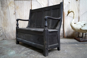 A Late 19thC Provincial Black Painted Pine Box Settle c.1880