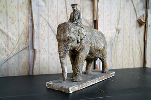 A Painted Plaster Sculpture of an Elephant & Handler; Frederick Thomas Daws; (1878-1956)
