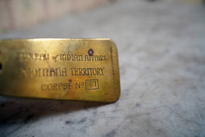 A Solid Brass American Corpse Identification Tag from the ‘Bureau of Indian Affairs; Montana Territory; no.91’ c.1930