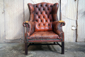 A Mid 20thC Oxblood Leather Button-Back Wingback Armchair