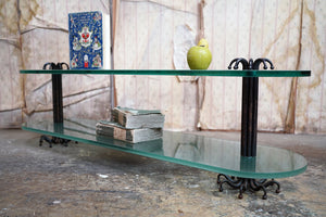 A Late 20thC Glass & Cast Iron Two-Tiered Table by Paul Belvoir c.1994