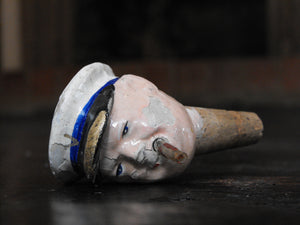 A 1920's Papier-Mache & Cork Bottle Stopper of Winston Churchill