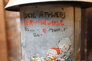 A Charming c.1934 Crawford & Sons Ltd Tin Biscuit Barrel Money Box; 'Fairy House' by Mabel Lucie Attwell
