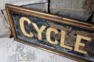 A Large Early 20thC Reverse Glass Painted Cycle Maker Advertising Sign c.1930-35