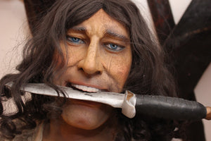 An Absurd Life Size Resin Climbing Pirate Statue