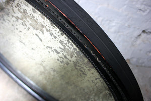 An Attractive Ebonised Victorian Oval Wall Mirror c.1870