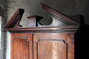 A Handsome Architectural George III Mahogany Linen Press Later Adapted to a Wardrobe c.1780