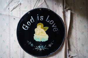 An Unusual Edwardian Period Reverse Glass Painted Plaque; ‘God is Love’ c.1905-10