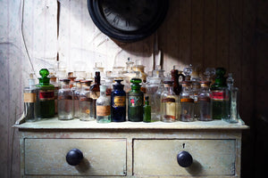 A Large Mixed Collection of Forty-Four 19thC-20thC Glass Apothecary Bottles