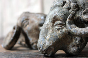 A Pair of c.1800 Painted & Gilded Lead Mounts in the Form of Rams Heads