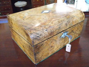 A Victorian Semi Domed Figured Walnut Writing Slope with Amboyna & Mother of Pearl