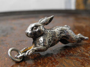 A Delightful Cast Silver Plate Charm Pendant Formed as a Running Hare