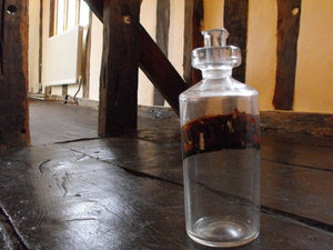 A Late 19thC Glass Apothecary Bottle with Spout for Dilute Castor Oil