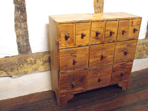 A Victorian Antique Country Pine Flight of Twelve Drawers