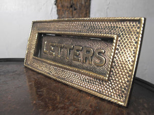 A Smart Art Deco Brass Letterbox