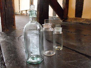 A Trio of Late 19thC Plain Glass Apothecary Bottles to Include One in Light Green