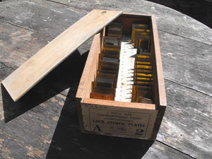 A Versatile Boxed Set of One Inch Sized Victorian Brass Stencil Plates