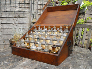 A Superb French Mahogany Campaign Apothecary Chest to Include Thirty-Five Bottles