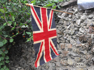 A Mounted British Vintage Printed Union Jack Flag on Pole