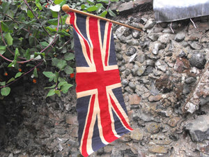 A Mounted British Vintage Printed Union Jack Flag on Pole