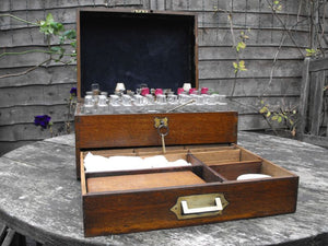 A Good 19thC British Oak Campaign Apothecary Chest to Include Sixty-Seven Bottles