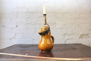 An Unusual 19thC Treacle Glazed Jug Formed as a Monkey & Converted into a Chamberstick