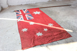 A Super British Empire Australian Red Ensign Flag Mounted on a Pole