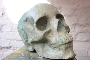A Contemporary Composition Stone Sculpture of a Human Skull