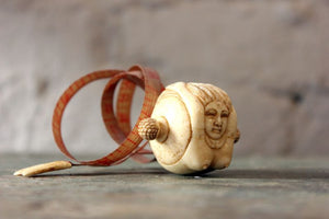 A Fine Early 20thC Carved Bone Novelty Tape Measure in the Form of a Mermaid