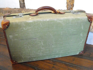 A Modest yet Modish Vintage Leather and Canvas Travel Suitcase