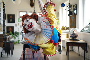 A 20thC Lifesize Painted Plaster & Silk Theatre Prop Model of an Acrobatic Clown by Mark Thompson