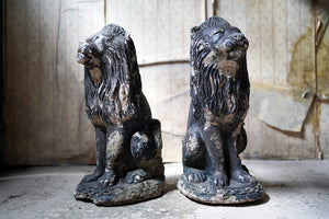 A Pair of Early 20thC Black Painted Stone Garden Lions c.1930-40