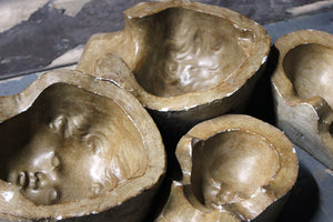 Two Pairs of Early 20thC Pottery Doll Moulds