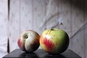 A Pair of Early 20thC Italian Carved Marble Faux Fruits as an Apple & Peach