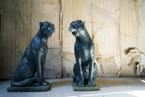 A Pair of Mid-20thC Black Painted Composition Stone Panthers