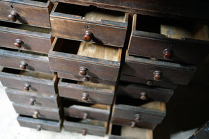 A Late 19thC Stained Pine Bank of Twenty-One Drawers c.1890