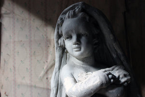 A Painted Plaster Figure of a Putto c.1900