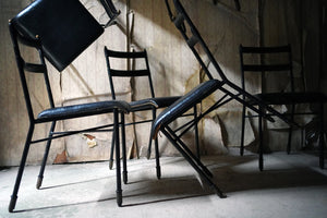 A Set of Six French Black Leather Dining Chairs by Jacques Adnet c.1950