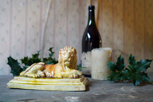 A Late 18thC English Slipware Pottery Model of a Recumbent Lion c.1790