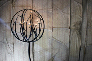 A Large 20thC Black Wrought Iron Floor-Standing Ten-Sconce Sphere Candelabra