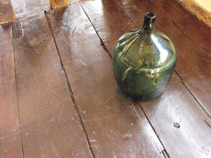 A Very Large Vintage Green Glass Bottle