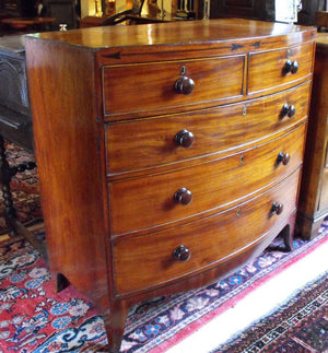 A Whimsical 19th Century Mahogany & Ebony Inlaid Bow Fronted Chest of Drawers