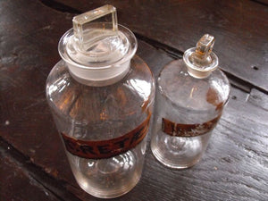 Two Late 19thC Glass Apothecary Bottles with Painted Gold Banners for Chalk and Muskroot
