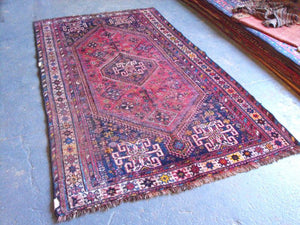 A Beautifully Worn Semi Old Persian Shiraz Rug 242cm x 140cm