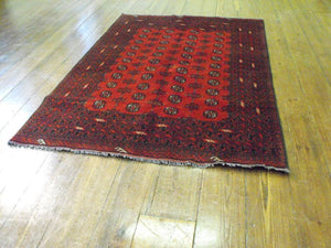 A Versatile Red Afghan Rug: 235cm x 160cm