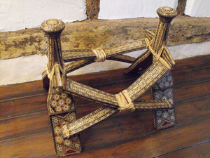 A Moorish Olive Wood & Inlaid Camel Saddle Stool